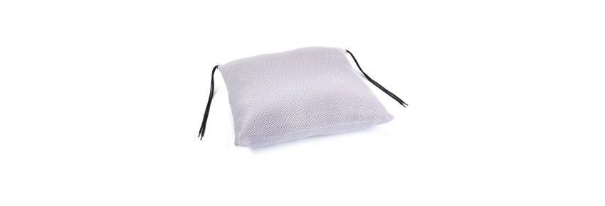 Siliconized hollow fiber pillow with central cover